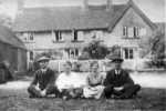 Tallents Farmhouse: with group of four sitting outside including Lionel Goldhawk and his wife on the right